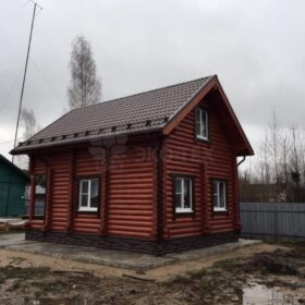 Фото дома и бани из оцилиндрованного бревна