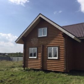 Фото дома и бани из оцилиндрованного бревна