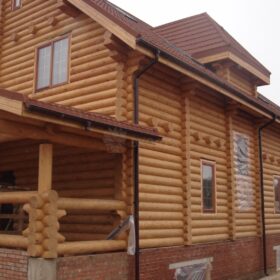 Фото дома и бани из оцилиндрованного бревна
