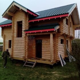 Фото дома и бани из оцилиндрованного бревна