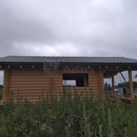 Фото дома и бани из оцилиндрованного бревна