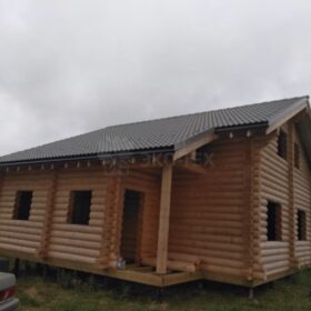 Фото дома и бани из оцилиндрованного бревна